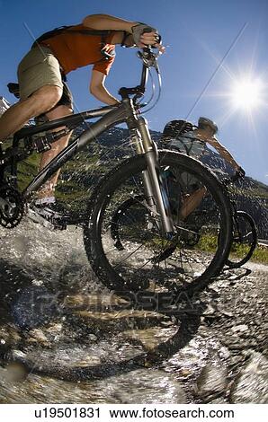 Mountain biking in the Val de Bagnes, Switzerland near the Cabane de Chanrion View Large Photo Image Stock Image - Mountain biking in the Val de Bagnes, Switzerland near the Cabane de Chanrion. Fotosearch