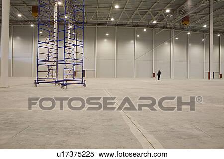 Movable stacking frame in empty warehouse View Large Photo Image Stock Photography - Movable stacking frame in empty warehouse. Fotosearch
