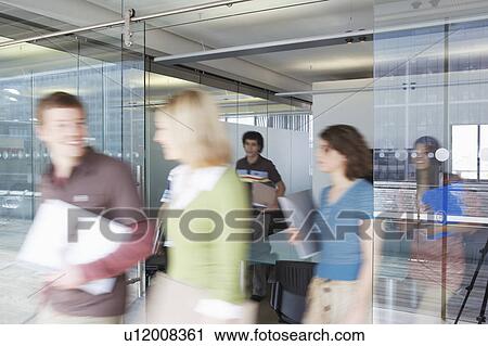Office workers leaving conference room, long exposure View Large Photo Image Stock Image - Office workers leaving conference room, long exposure. Fotosearch