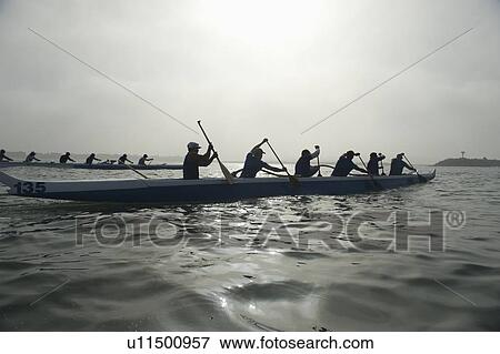 Outrigger canoeing team compete View Large Photo Image Stock Photo - Outrigger canoeing team compete. Fotosearch