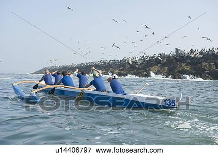 Stock Photo - Outrigger canoeing team in training. Fotosearch