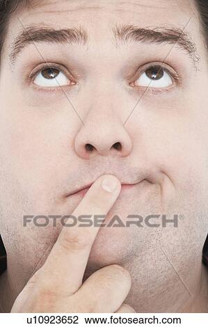 Overweight Man with Finger on Mouth, portrait, close up View Large Photo Image Stock Image - Overweight Man with Finger on Mouth, portrait, close up. Fotosearch