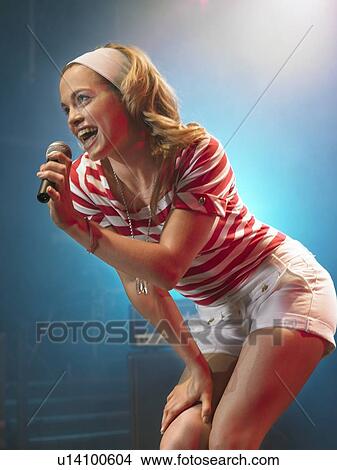 Picture - Pop Singer Performing on Stage. Fotosearch