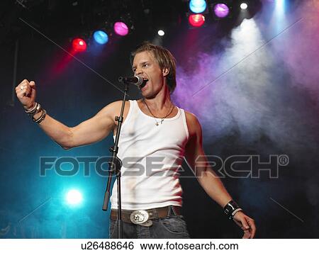 Pop Singer Performing on Stage View Large Photo Image Stock Photograph - Pop Singer Performing on Stage. Fotosearch