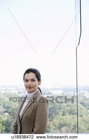 Stock Image - Portrait of business woman. Fotosearch