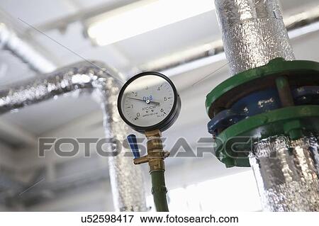 Stock Photo - Pressure gauge in warehouse. Fotosearch