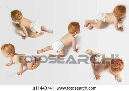 Stock Image - Redheaded Baby on the Move, montage. Fotosearch