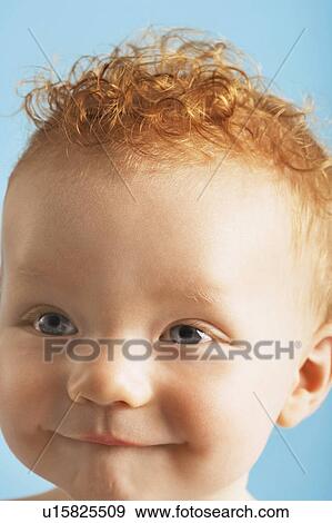 Redheaded baby with pursed lips View Large Photo Image Stock Photo - Redheaded baby with pursed lips. Fotosearch