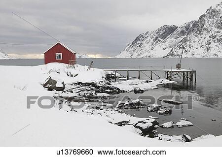 Stock Image - Remote house in coastal landscape, Skjelfjord, Flakstadoya, Loftofen, Norway. Fotosearch
