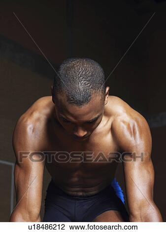 Runner crouching down View Large Photo Image Stock Image - Runner crouching down. Fotosearch