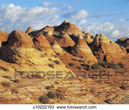 Stock Image - Sandstone formations in desert. Fotosearch