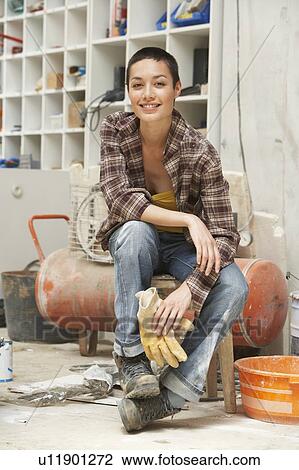 Stock Image - Sculptor in Studio. Fotosearch