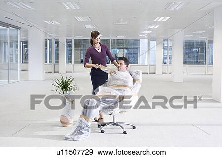 Secretary Wrapping Businessman View Large Photo Image Stock Photo - Secretary Wrapping Businessman. Fotosearch