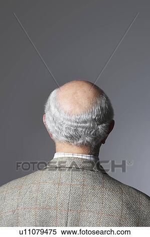 Stock Photography - Senior Man in studio, head and shoulders, back view. Fotosearch
