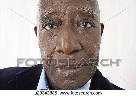 Senior Man in studio, head and shoulders, close up View Large Photo Image Stock Photography - Senior Man in studio, head and shoulders, close up. Fotosearch