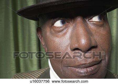 Senior Man Wearing a Hat in studio, close up View Large Photo Image Stock Photograph - Senior Man Wearing a Hat in studio, close up. Fotosearch