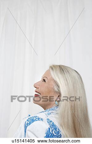 Senior woman in studio, profile, head and shoulders View Large Photo Image Stock Photography - Senior woman in studio, profile, head and shoulders. Fotosearch