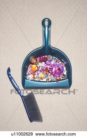 Shattered ornament in dustpan, view from above View Large Photo Image Stock Photo - Shattered ornament in dustpan, view from above. Fotosearch