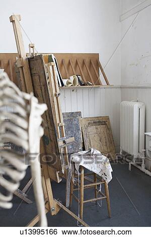Skeleton and easel in artist's studio View Large Photo Image Stock Photograph - Skeleton and easel in artist's studio. Fotosearch