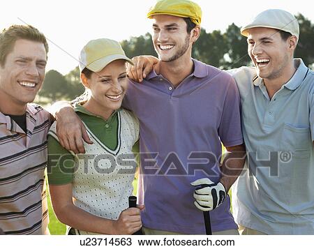 Smiling group young golfers with arms around each other's shoulders on golf course View Large Photo Image Stock Image - Smiling group young golfers with arms around each other's shoulders on golf course. Fotosearch