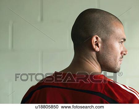 Stock Image - Soccer player, profile. Fotosearch