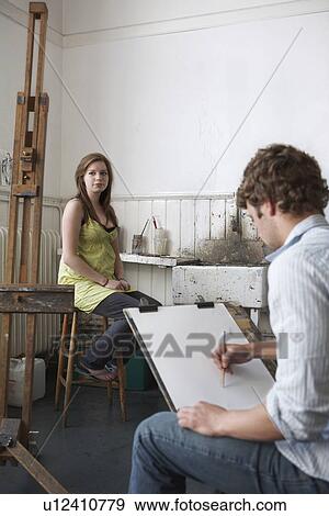 Stock Photo - Student sketching model in art class. Fotosearch