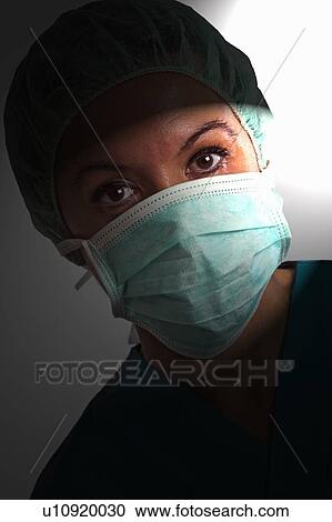 Theatre nurse in medical scrubs View Large Photo Image Stock Image - Theatre nurse in medical scrubs. Fotosearch