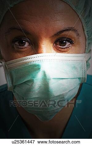 Theatre nurse in medical scrubs View Large Photo Image Stock Photo - Theatre nurse in medical scrubs. Fotosearch