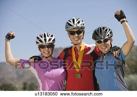 Three female cyclists win cycling contest View Large Photo Image Stock Image - Three female cyclists win cycling contest. Fotosearch