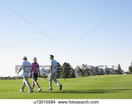 Three Golfers on Course View Large Photo Image Picture - Three Golfers on Course. Fotosearch