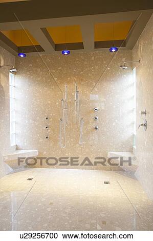 Stock Image - Tiled hydrotherapy suite. Fotosearch