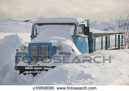 Truck is snowed in, Flakstadoya, Loftofen, Norway View Large Photo Image Stock Photography - Truck is snowed in, Flakstadoya, Loftofen, Norway. Fotosearch