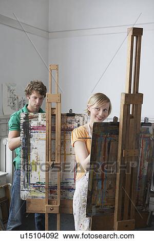 Two artists painting in studio View Large Photo Image Stock Image - Two artists painting in studio. Fotosearch