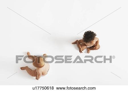 Two Babies from above View Large Photo Image Stock Photo - Two Babies from above. Fotosearch