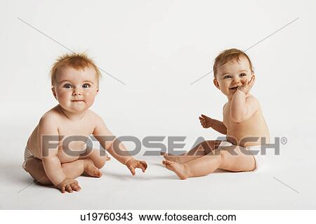 Stock Image - Two Baby Girls. Fotosearch