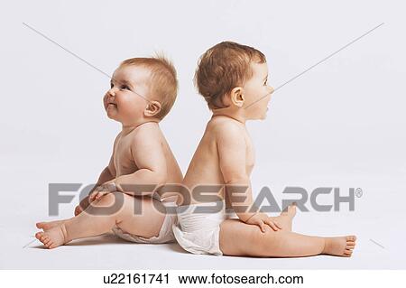 Stock Image - Two Baby Girls. Fotosearch