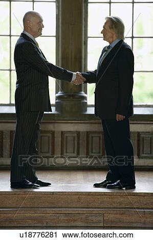 Two businessmen Shaking Hands View Large Photo Image Stock Image - Two businessmen Shaking Hands. Fotosearch