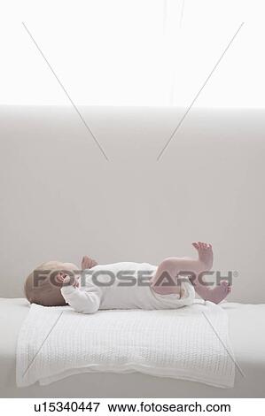 Stock Photo - Two week old newborn baby. Fotosearch