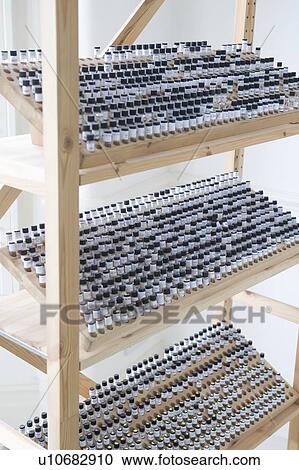 Vials in wooden stand View Large Photo Image Stock Image - Vials in wooden stand. Fotosearch