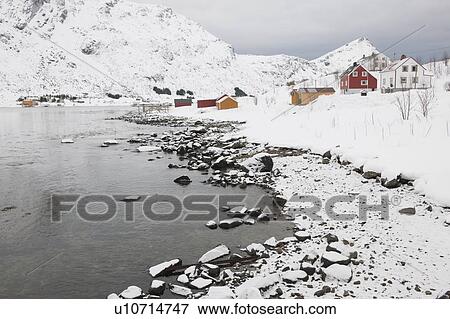 Stock Photo - Village in coastal landscape, Skjelfjord, Flakstadoya, Loftofen, Norway. Fotosearch