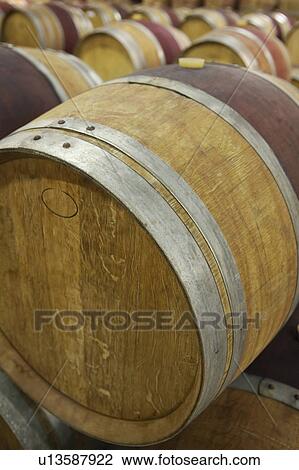 Wine casks lying down in order View Large Photo Image Stock Image - Wine casks lying down in order. Fotosearch