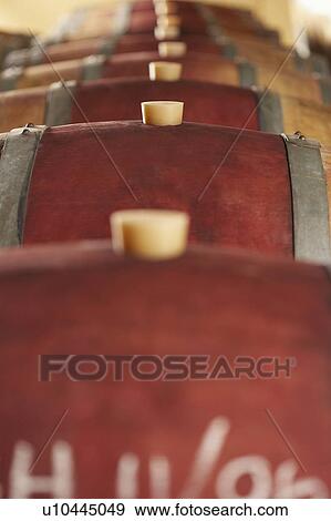 Wine casks lying down in order, selective focus View Large Photo Image Stock Photo - Wine casks lying down in order, selective focus. Fotosearch