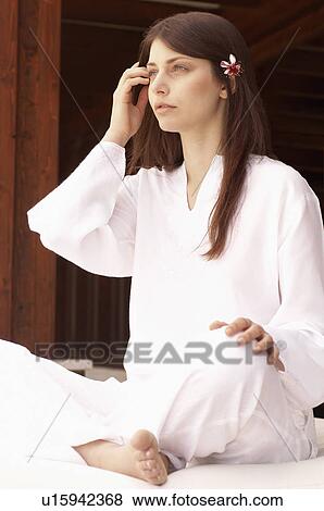Stock Photo - Woman meditating, portrait. Fotosearch