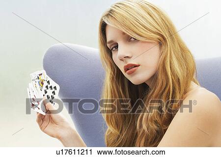 Woman sitting Playing Cards, portrait View Large Photo Image Stock Image - Woman sitting Playing Cards, portrait. Fotosearch