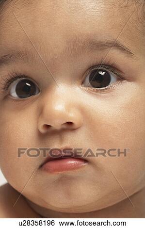 Stock Photograph - Worried baby. Fotosearch