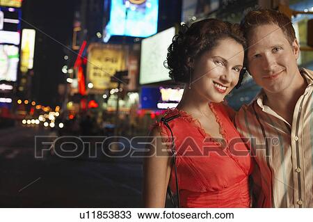 Young Couple in City at Night, close up View Large Photo Image Stock Image - Young Couple in City at Night, close up. Fotosearch