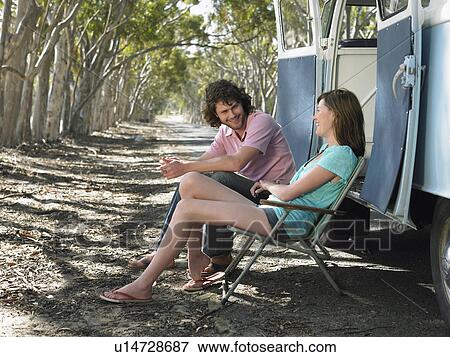 Young Couple Resting on Road Trip View Large Photo Image Stock Photo - Young Couple Resting on Road Trip. Fotosearch