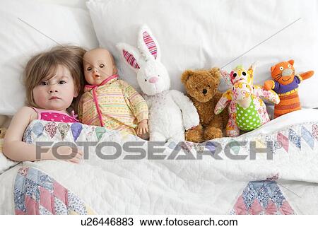 Young girl, 2-3 years with cuddly toys in bed View Large Photo Image Stock Image - Young girl, 2-3 years with cuddly toys in bed. Fotosearch