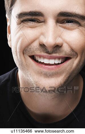 Stock Photograph - Young Man, smiling. Fotosearch