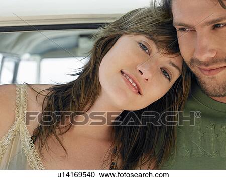 Young woman leaning on shoulder of young man, head and shoulders View Large Photo Image Stock Image - Young woman leaning on shoulder of young man, head and shoulders. Fotosearch